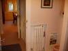 Looking from bathroom into the hall.