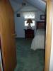 Inside the second upstairs bedroom.